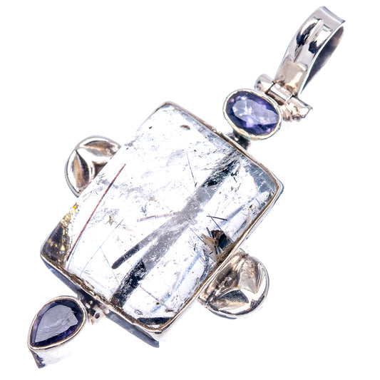 Sterling silver pendant featuring rectangular tourmalinated quartz with round blue iolite accents