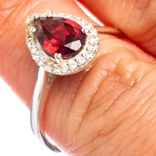 Sterling silver ring with red marquise stone and cubic zirconia halo, size 7