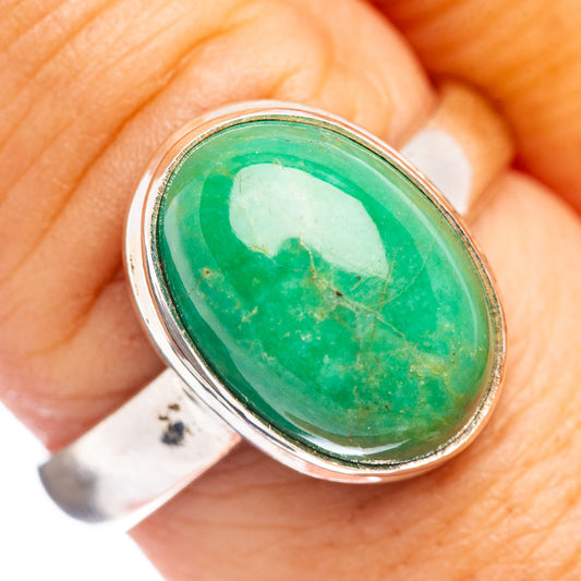 Sterling silver oval green gemstone ring with bezel setting