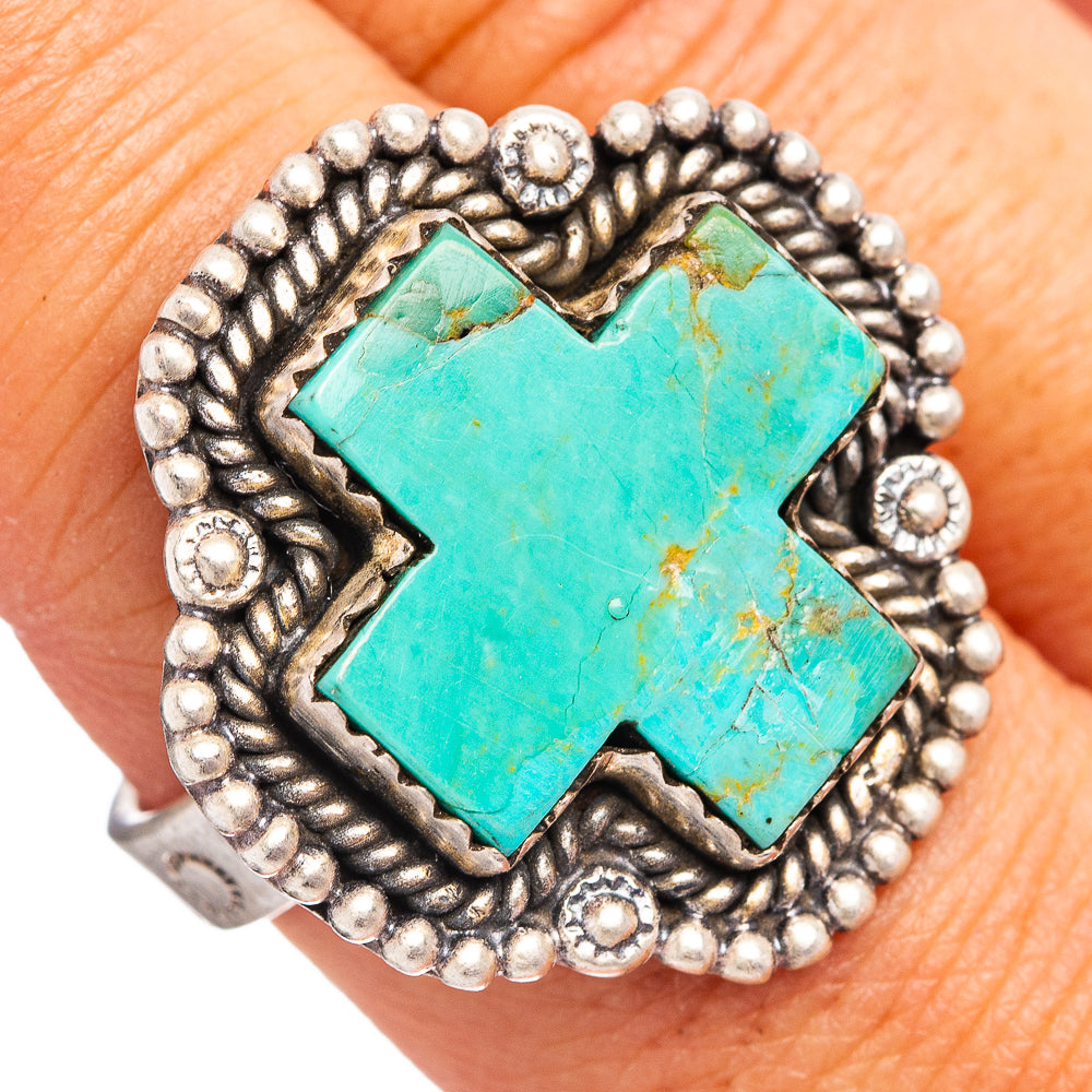 Turquoise cross ring with silver beaded border and gemstone-style center