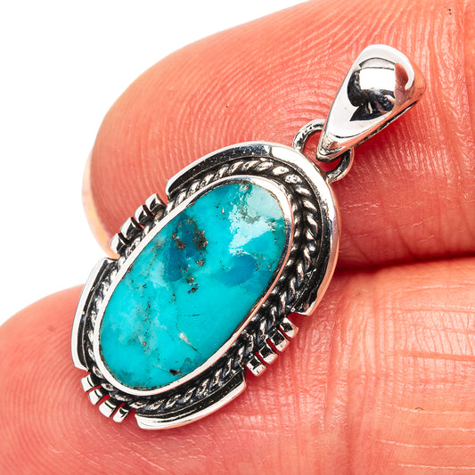 Native Style sterling silver turquoise oval pendant with bale and rope-style border