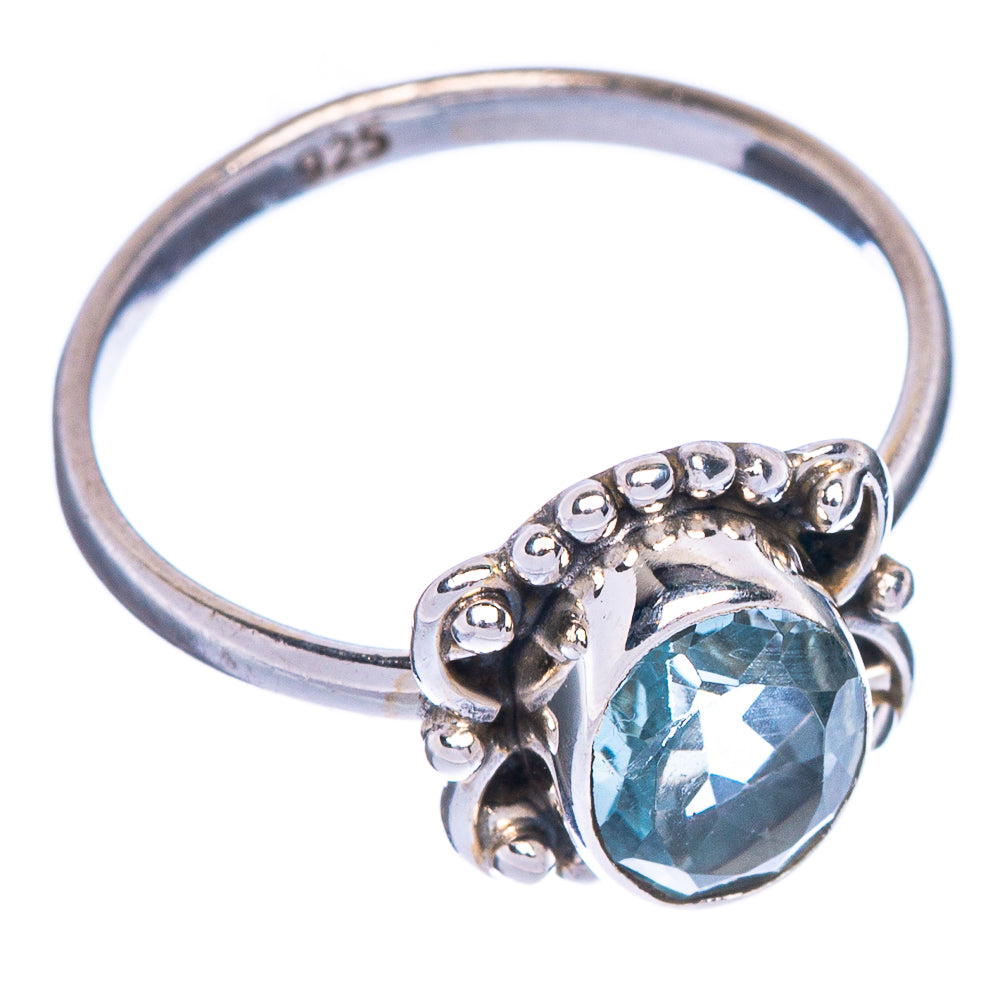 925 sterling silver ring with blue topaz oval center and side bead prong details