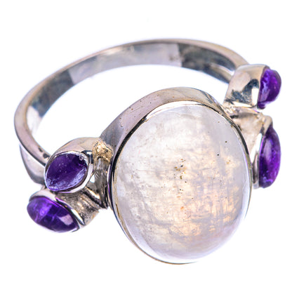 Sterling silver ring with round rainbow moonstone cabochon and three purple amethyst stones