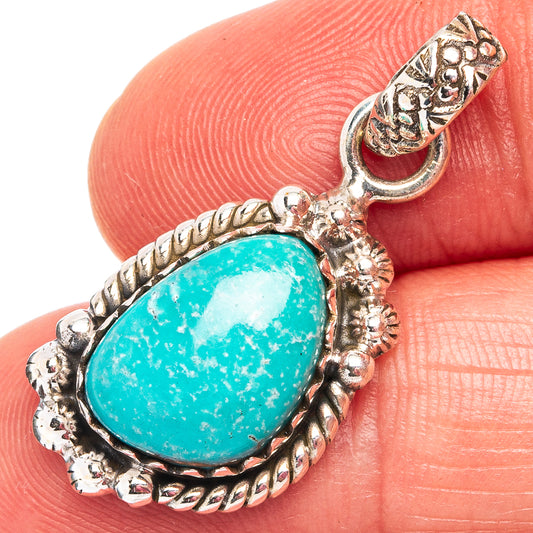 Turquoise oval cabochon pendant in ornate .925 sterling silver with rope border