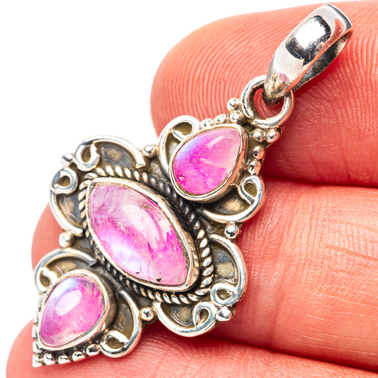 Pink moonstone pendant in .925 sterling silver with three teardrop settings