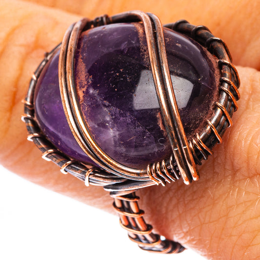 Oxidized copper wire ring with oval amethyst purple gemstone and layered bezel, size 8.25