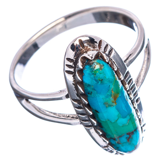 Sterling silver turquoise oval ring with ornate bezel and raised cabochon