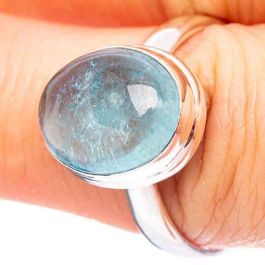 Oval aquamarine ring, .925 sterling silver, size 9, close-up on finger