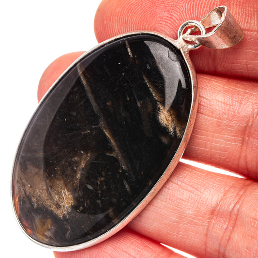 Silver-plated agate pendant, teardrop with black banding and silver bail