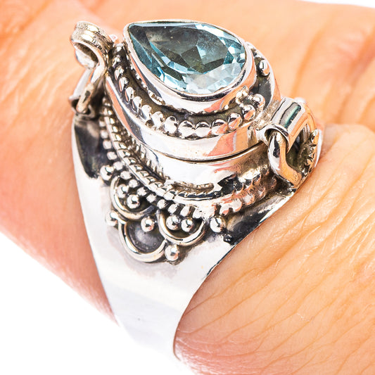 Sterling silver ornate poison ring with oval blue topaz gemstone, size 6.75