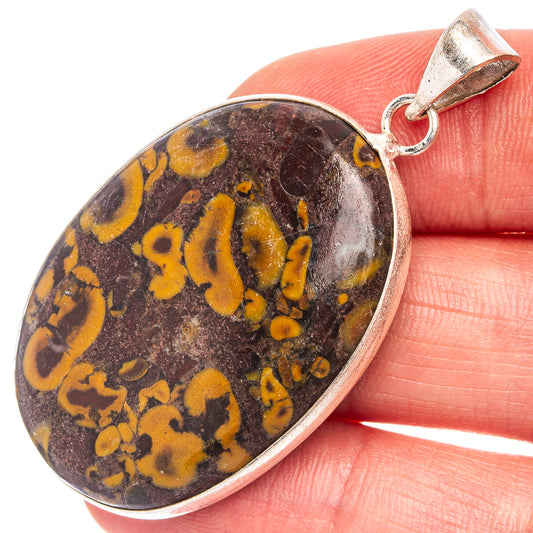 Bamboo jasper pendant with silver-plated bail, oval stone with yellow and burgundy speckles