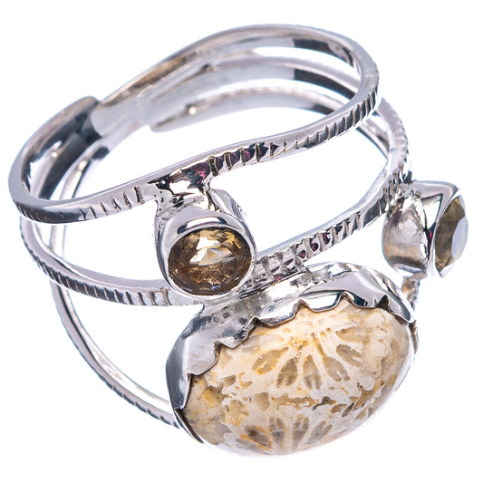 Sterling silver ring with oval fossil coral cabochon, round citrine, and carved band