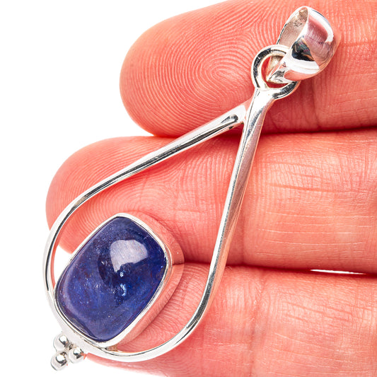 Teardrop tanzanite pendant in .925 sterling silver with blue gemstone, close-up