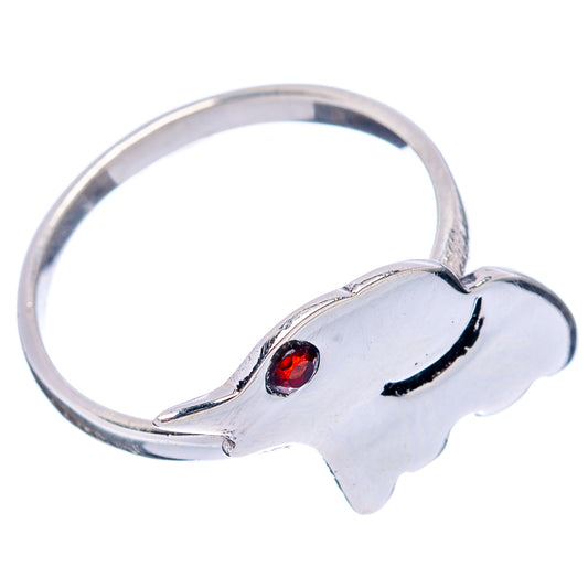 Sterling silver elephant ring, side view with red garnet eye on band