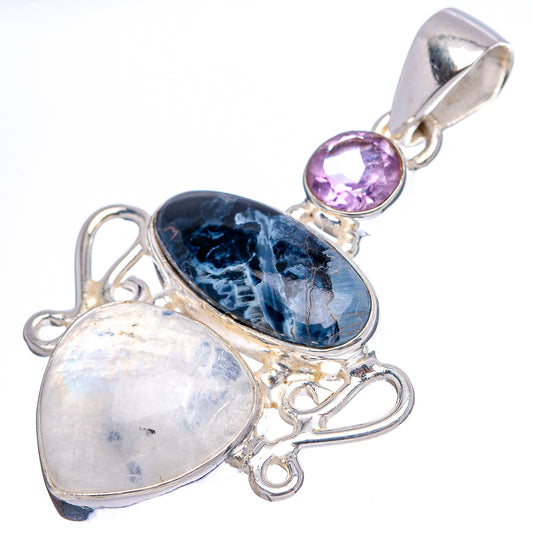 Sterling silver pendant with blue oval pietersite and pale oval moonstone, amethyst bail