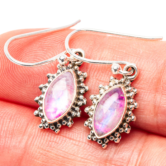 Sterling silver earrings with oval pink moonstone drops, ornate beaded prong border and hook