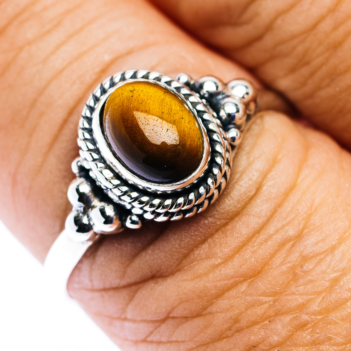 Oval tiger's eye cabochon dainty sterling silver ring with beaded rope border