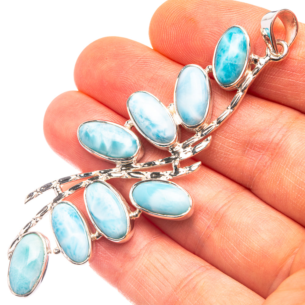 Larimar pendant in 925 sterling silver with oval blue stones and leaf-like frame