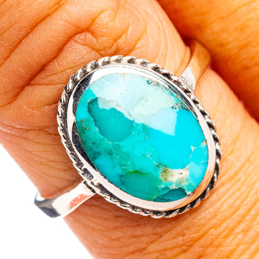 Turquoise oval cabochon ring with ornate .925 sterling silver bezel