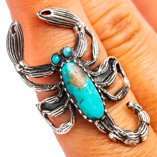 Turquoise scorpion statement ring with silver-tone claws and oval centerpiece stone