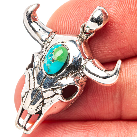 Turquoise cow skull pendant in .925 sterling silver, close-up with oval turquoise stone