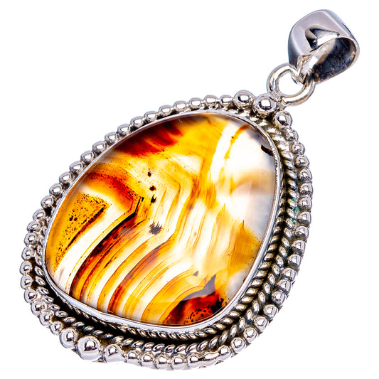 Sterling silver Montana agate pendant with oval orange-yellow swirled stone and bail