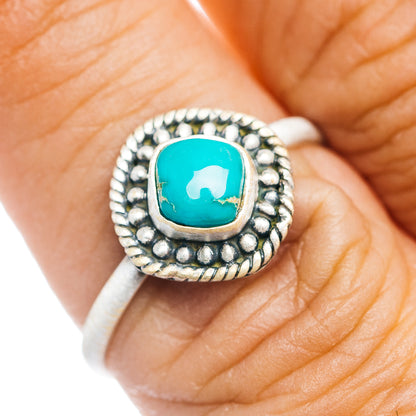 Turquoise gemstone ring in sterling silver with beaded bezel setting