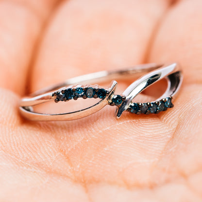 Sterling silver blue diamond ring with interlocking loop design
