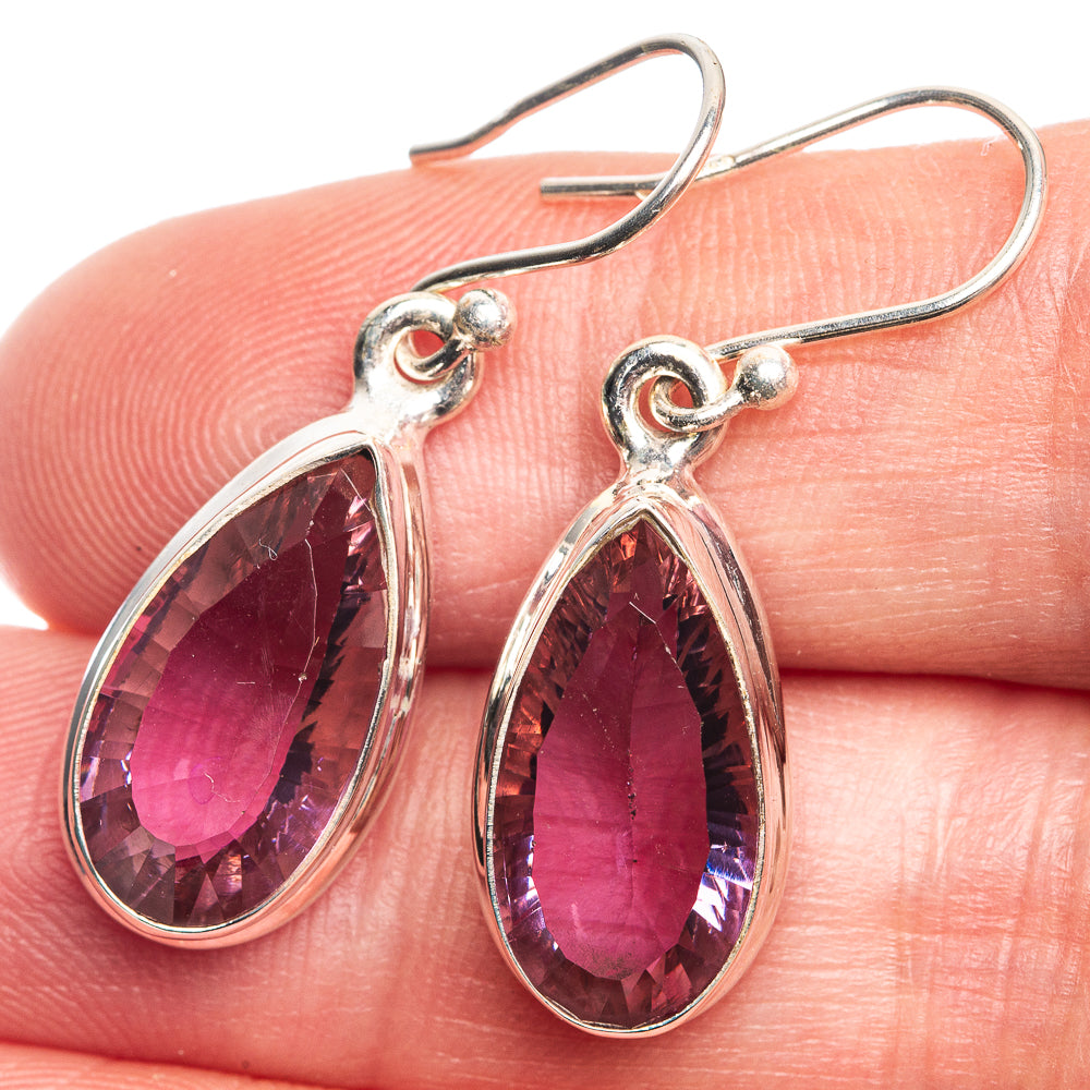 Sterling silver teardrop earrings with faceted purple-to-pink gemstone drops