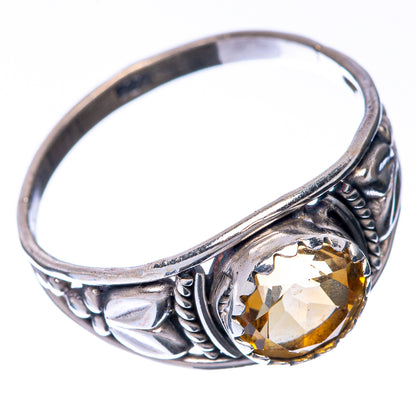 Sterling silver ring with faceted round citrine stone and carved decorative band
