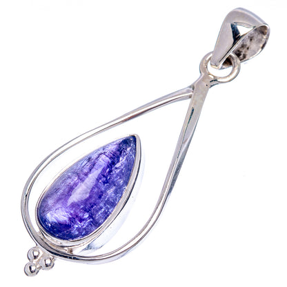 Sterling silver teardrop tanzanite pendant with blue-violet stone, oval frame.