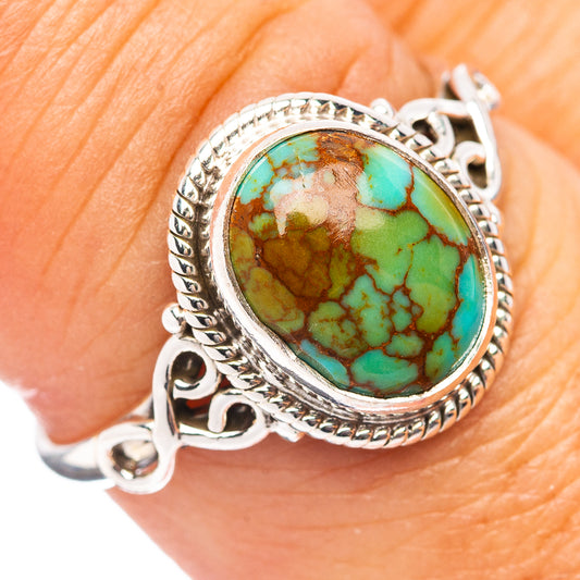 Oval turquoise cabochon sterling silver ring (.925), size 7.5, ornate bezel setting