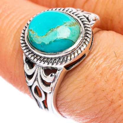 Oval turquoise cabochon ring in 925 sterling silver, size 8, ornate silver border