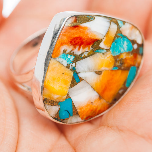 Oval sterling silver ring with turquoise and orange spiny oyster mosaic in bezel setting