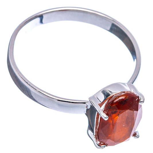 Orange kyanite sterling silver ring with oval faceted gemstone and three-prong setting