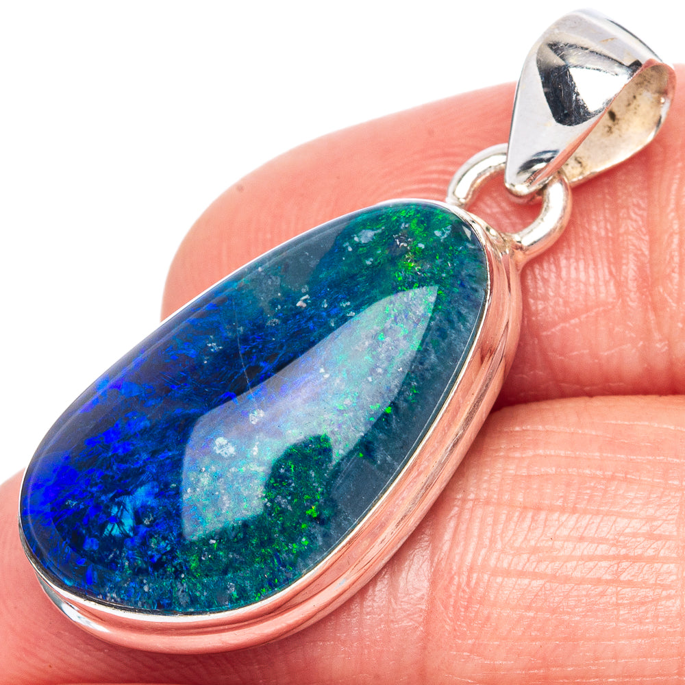 Sterling silver opal pendant with oval drop gemstone in blue and green