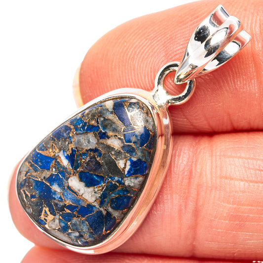 Sterling silver lapis lazuli heart pendant with top bail, close-up on hand