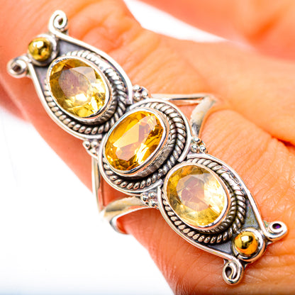 Sterling silver citrine ring with three oval yellow faceted stones, rope bezel