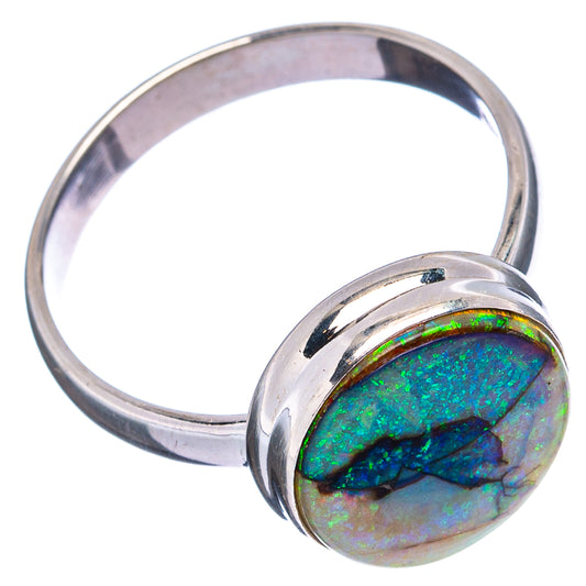 Sterling silver opal ring with raised round multicolor stone and split shank