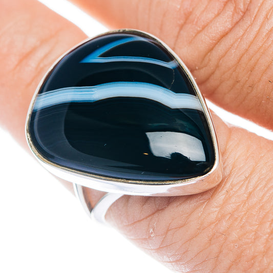 Teardrop black banded agate ring, .925 sterling silver bezel; close-up on finger