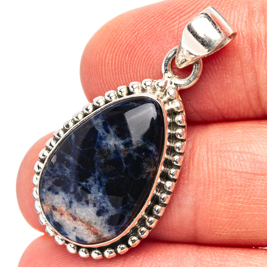 Sterling silver teardrop sodalite pendant with raised bezel and beaded border