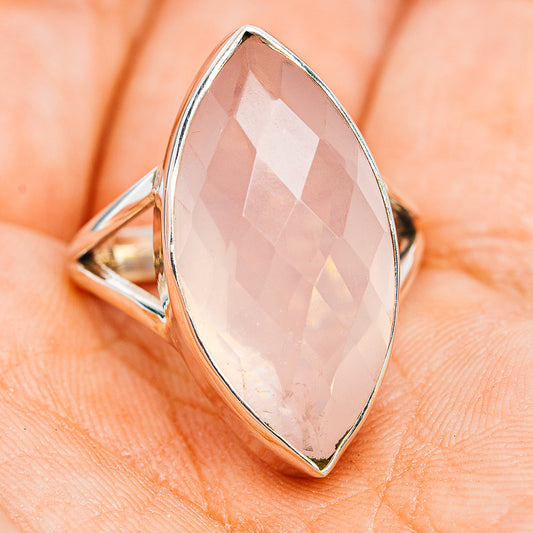 Marquise rose quartz faceted ring with .925 sterling silver band, front view on skin.