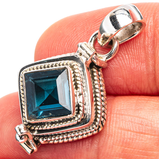 Sterling silver pendant with square dark-blue gemstone, rope border, loop bail