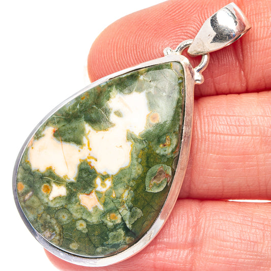 Sterling silver teardrop pendant with green-and-cream ocean jasper stone