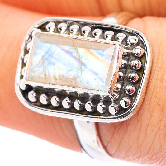 Sterling silver moonstone ring with rectangular opal-like gem and beaded bezel