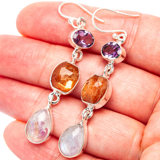 Sterling silver gemstone drop earrings with purple, orange, and white teardrop stones