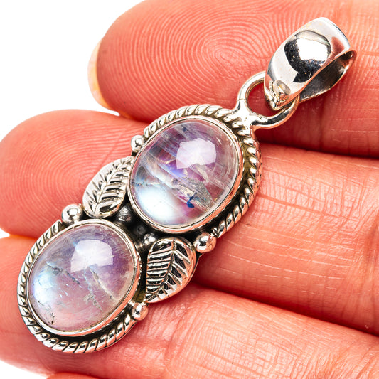 Rainbow moonstone pendant in .925 sterling silver with two oval cabochons and loop bail