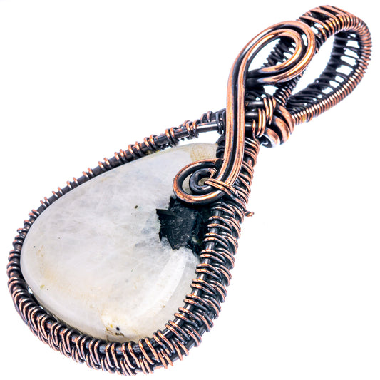 Teardrop moonstone pendant in oxidized copper wire wrap, black stone detail and loop bail