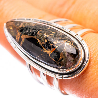 Sterling silver oval ring featuring dark onyx with gold flecks on top