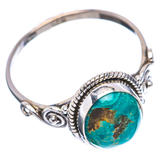 Oval turquoise cabochon ring in .925 sterling silver with rope-edge bezel and scroll details